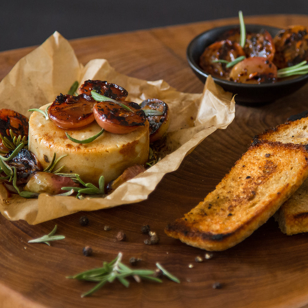 Paper-Baked CHEESE THE QUEEN CLASSIC with grilled Grapes and Rosemary
